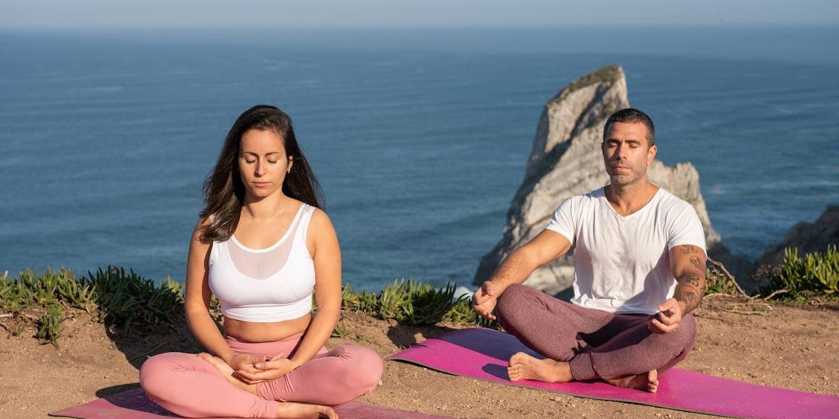 A serene yoga session overlooking the ocean in Portugal, perfect for relaxation and meditation.